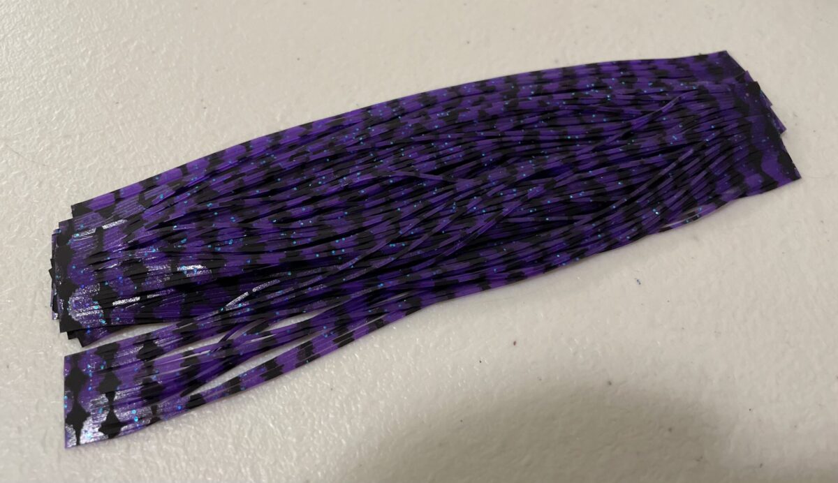 Purple w/ black bars & blue glitter rubber legs